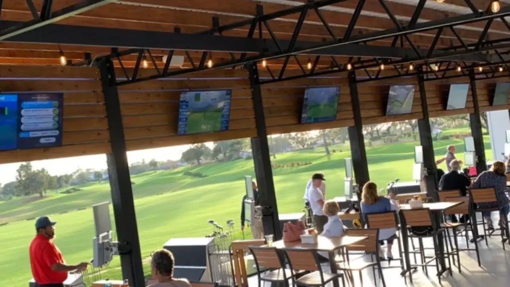 A render of inside the golf gaming range at Grand Island Park